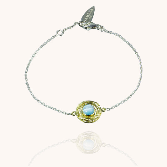 Physis silver and gold bracelet with blue cats eye