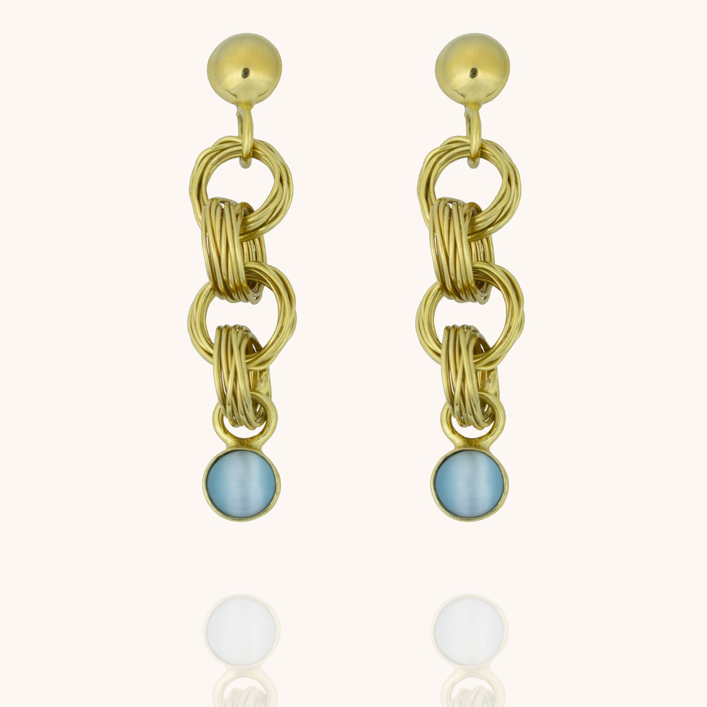 Physis gold vermeil dangle earrings with sky blue cats eye